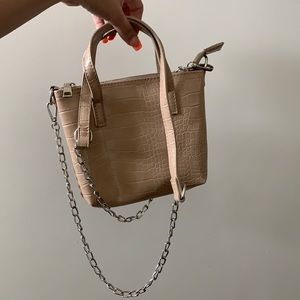 nude purse